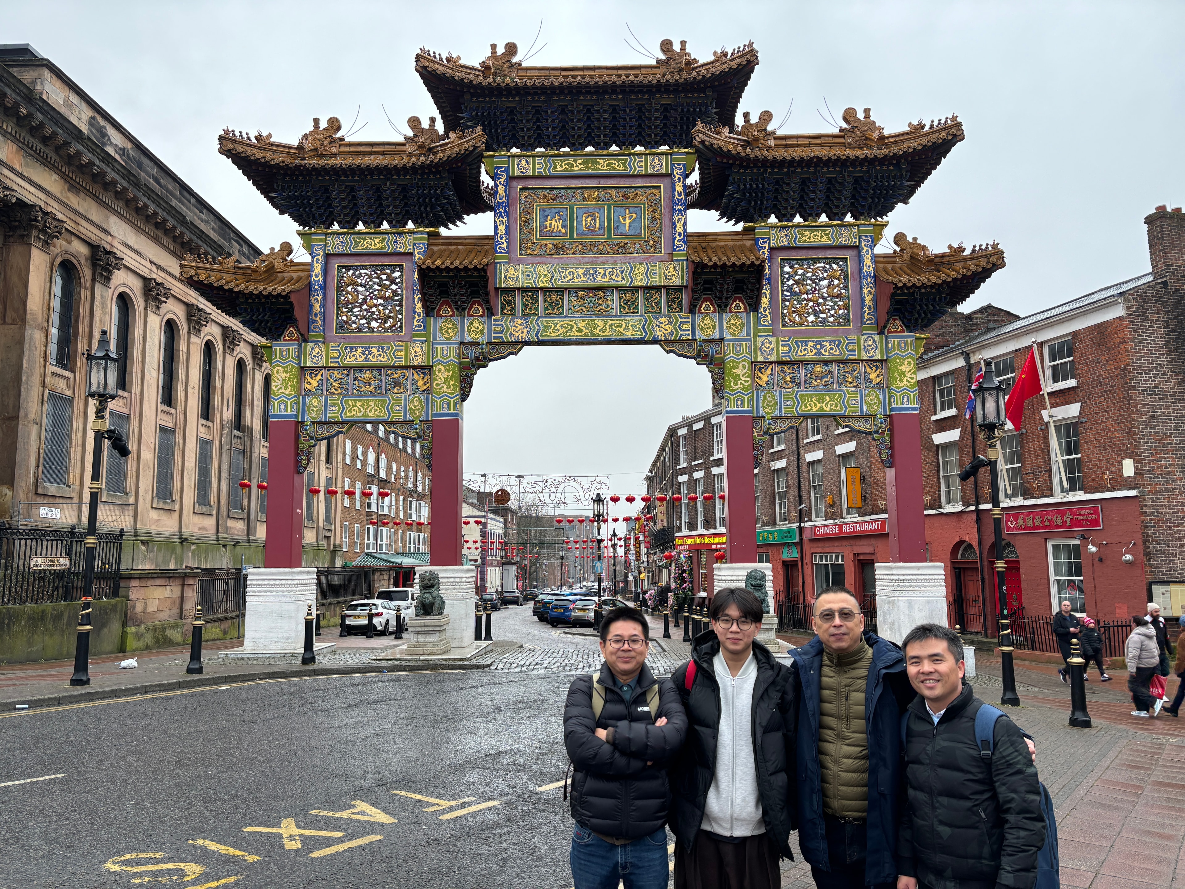 Chinese manufacturing partners visiting Liverpool Chinatown during a UK visit