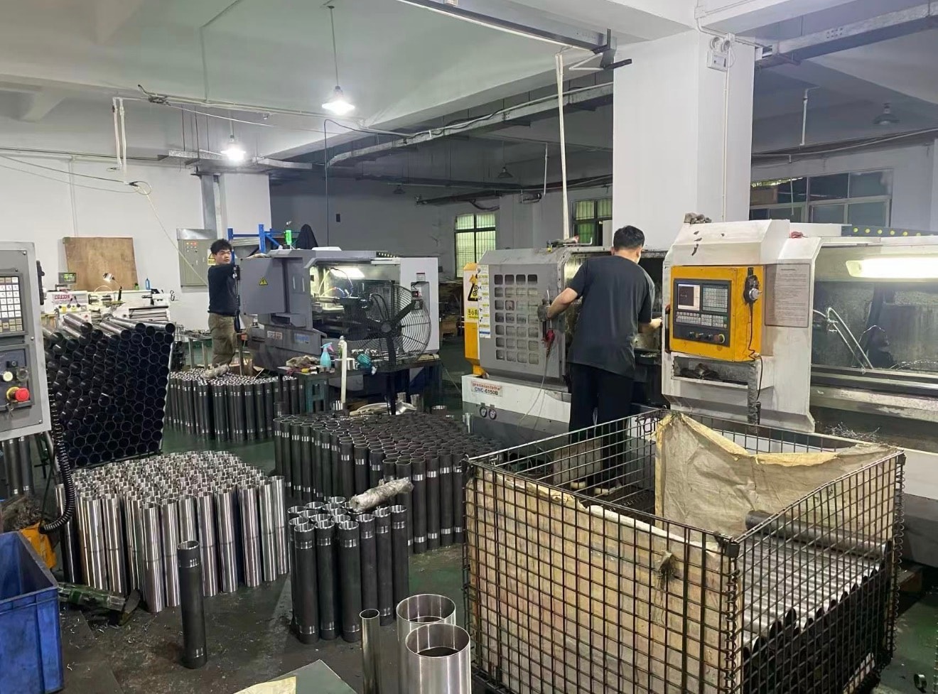 Metal tubes and components being manufactured for conveyor rollers in China