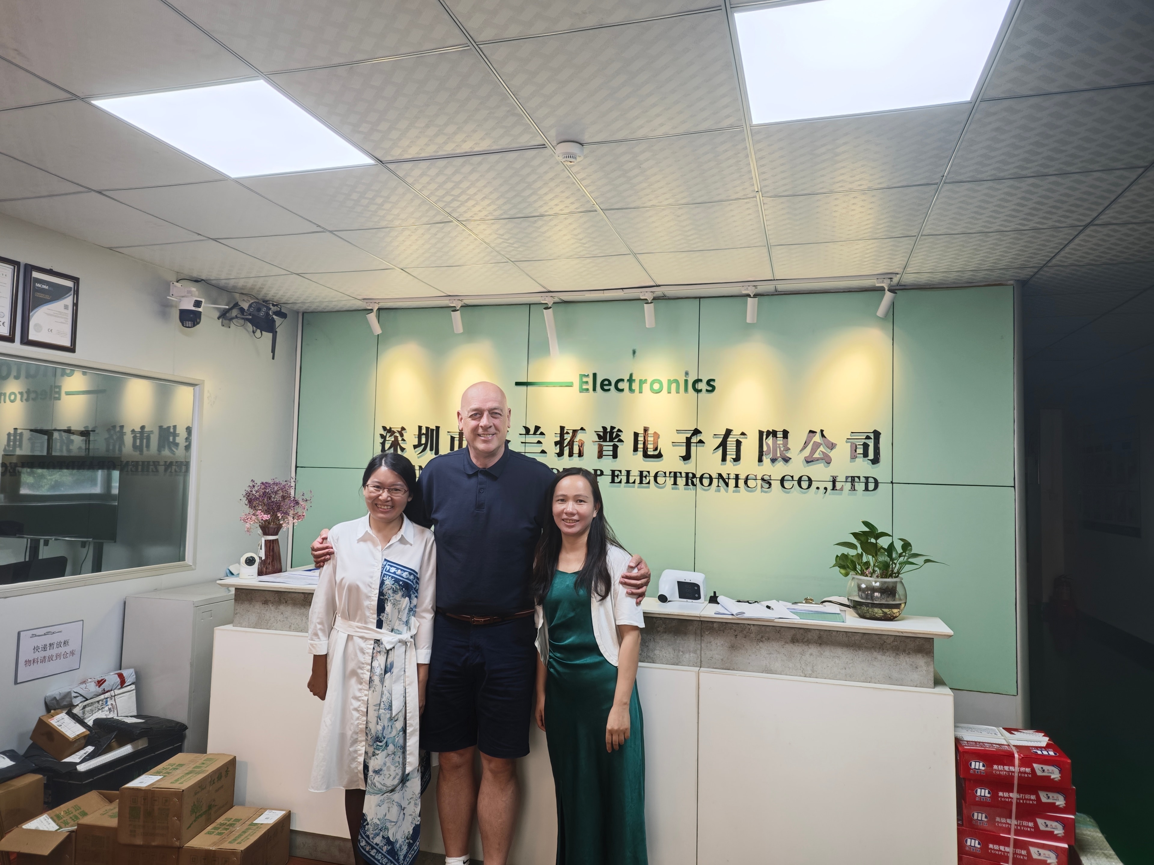 Colin Moore with members of the electronics manufacturing team at the Shenzhen facility