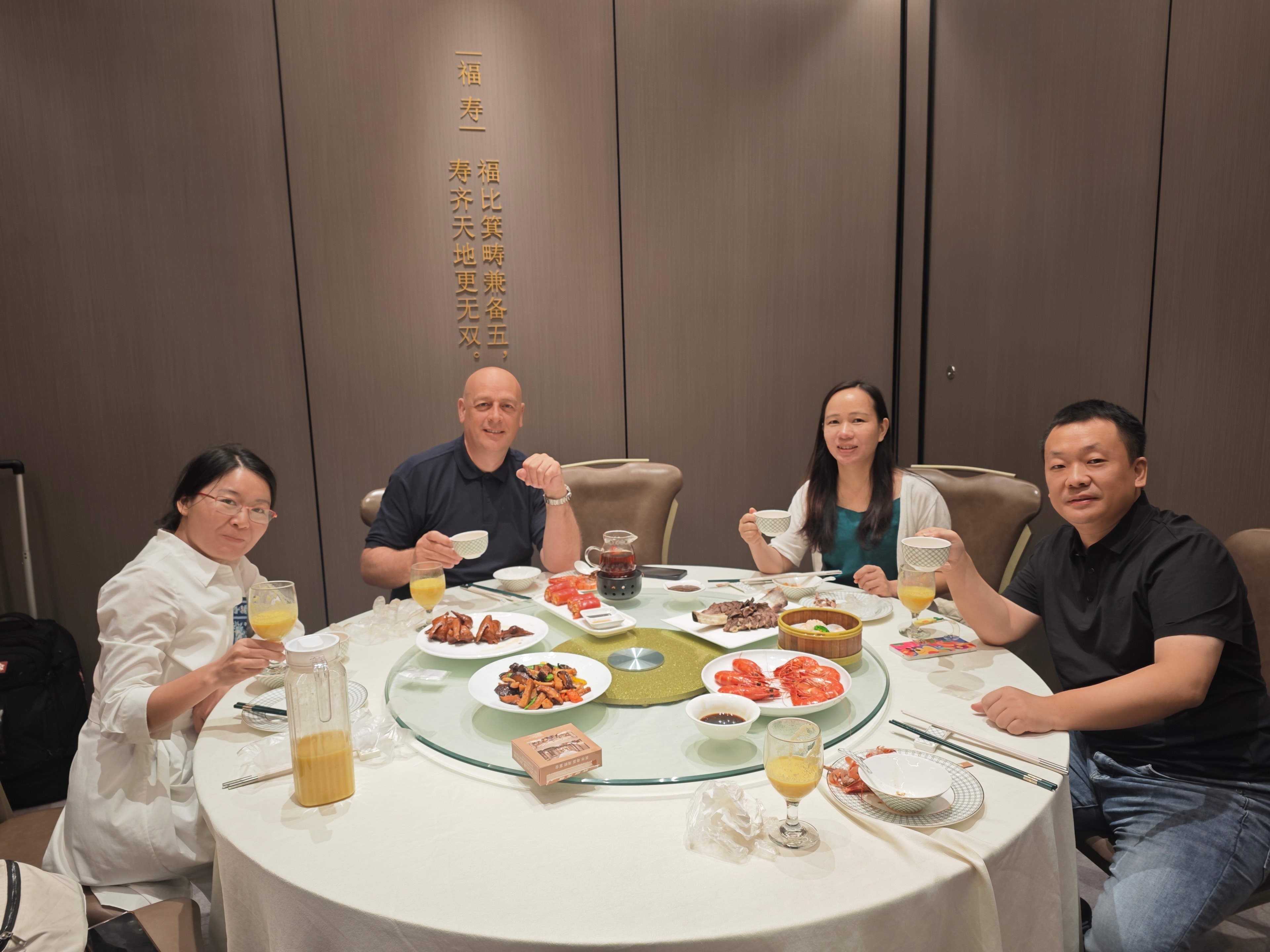 Colin Moore dining with the Shenzhen electronics manufacturing team — part of maintaining long-term supplier relationships in China